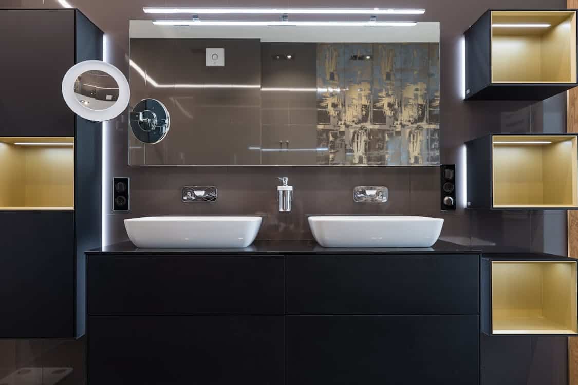 modern bathroom with a double sink vanity stylish cabinets and a large mirror - Kitchener's Bathroom Vanity Market Is Splitting Into Two Distinct Price Tiers in 2026