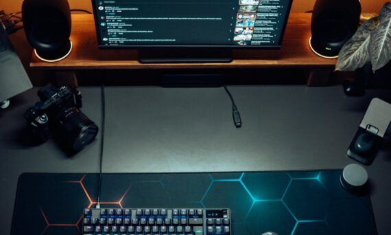 desk setup with monitor keyboard and mouse 570x342 - As Desk Mats Get Bigger, Designing One That Actually Fits Your Setup Gets Trickier