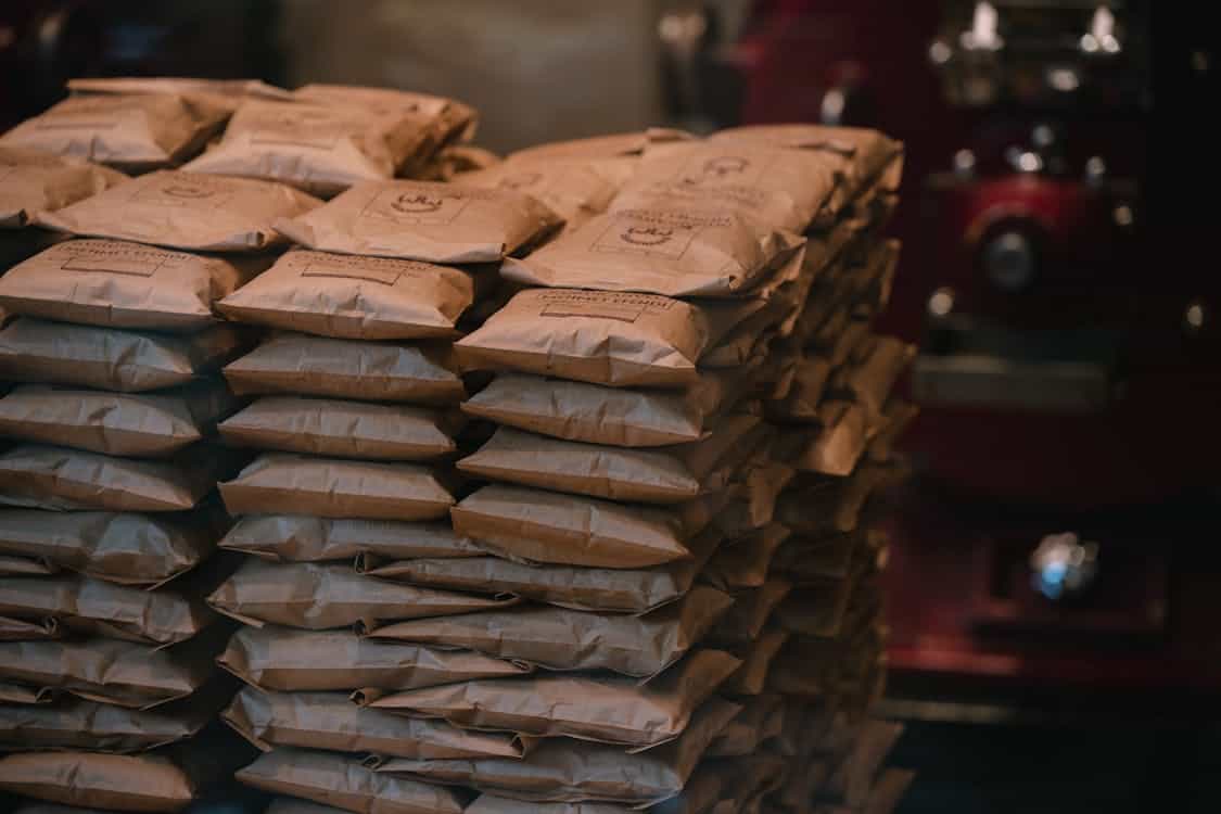 Australia Missed Its 2025 Packaging Targets. Now Comes the Hard Part stacked items in brown paper packaging - Australia Missed Its 2025 Packaging Targets. Now Comes the Hard Part