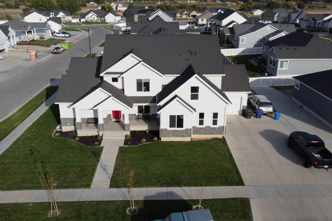 Aerial view of a modern suburban home - What Redfin's Austin Cool-Off Forecast Could Mean for Round Rock Roofing Demand